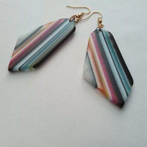 Bring unique visual interest to your accessories with these Oblong Striped earri